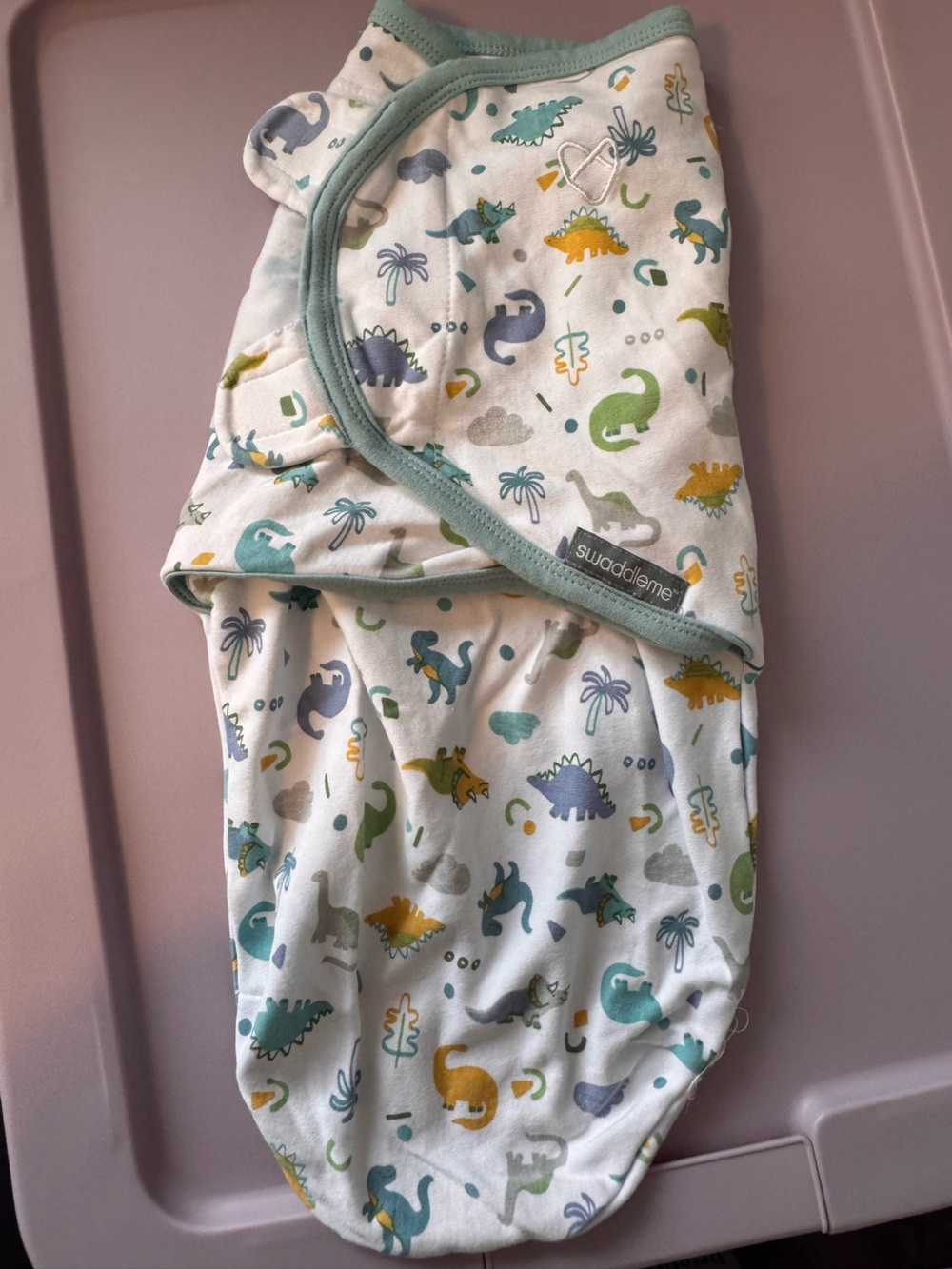 SwaddleMe White Bib with Green, Blue and Yellow Dinosaur Print 0-3 months